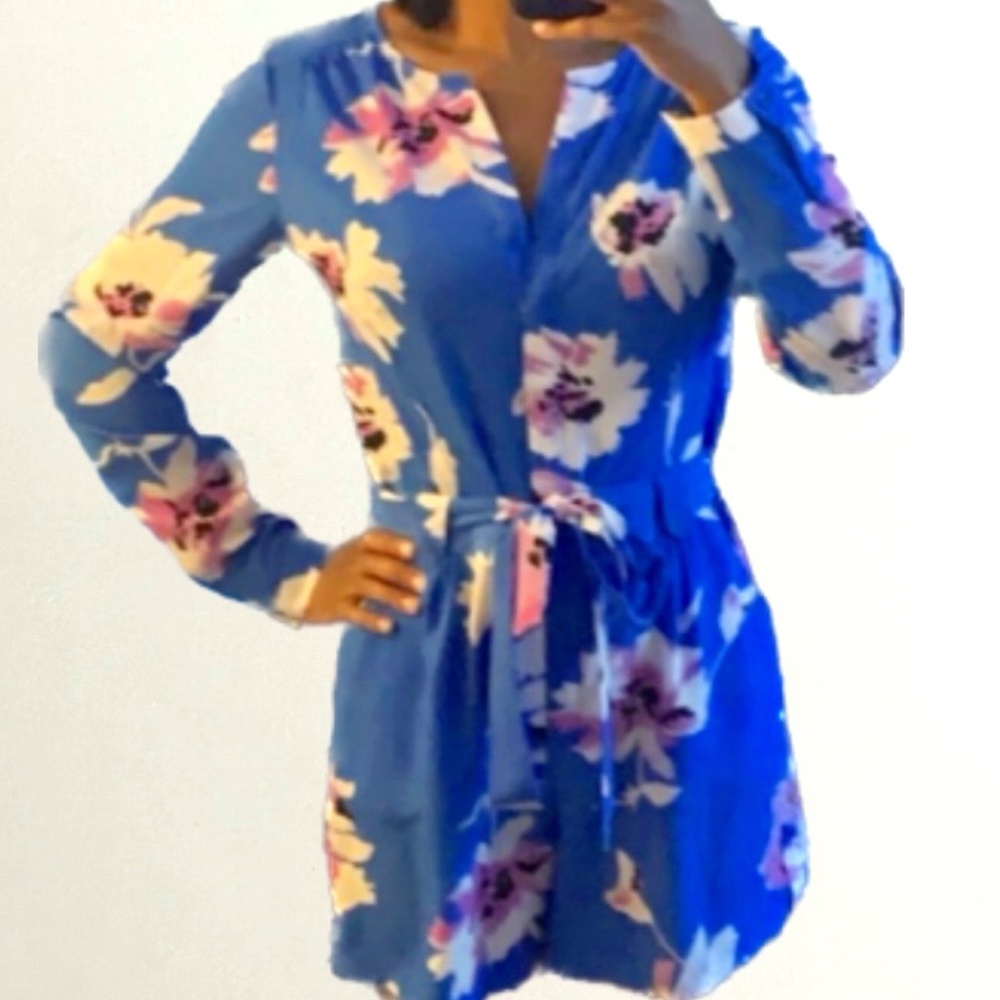 Electric Blue Floral Romper with White, Pink, and Black Flowers